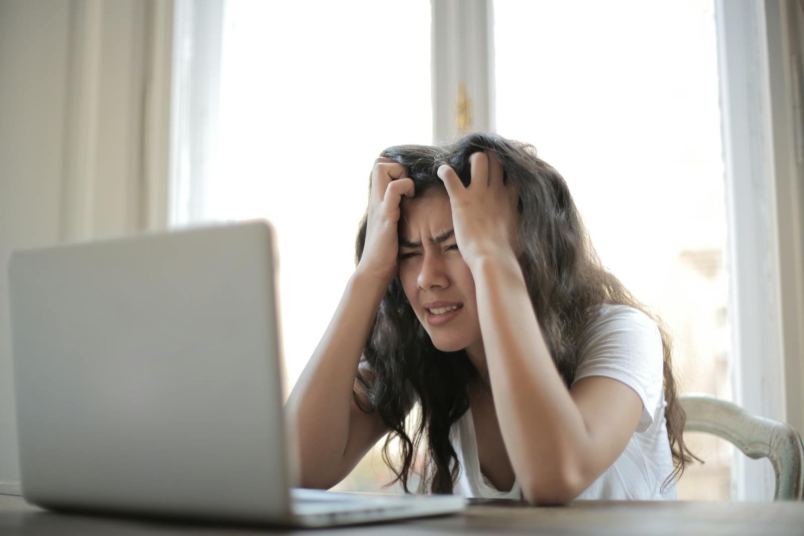 Woman in White Shirt feeling anxiety