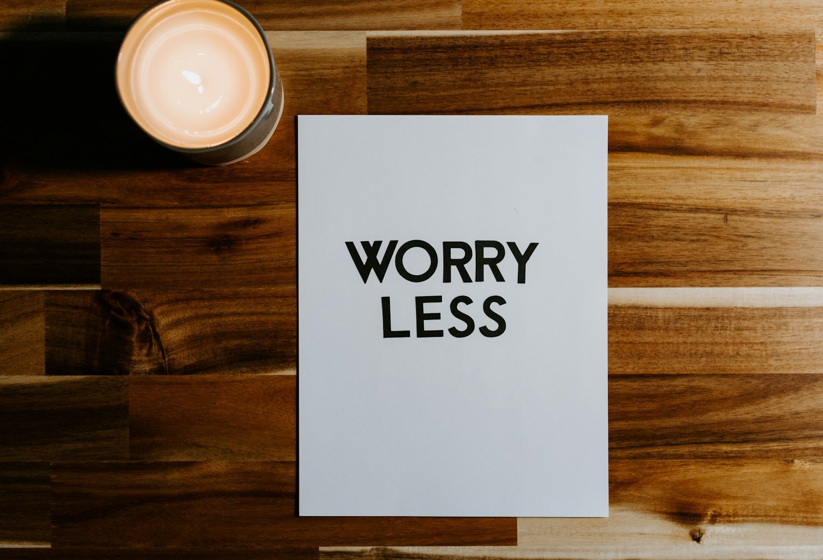 white and black worry less card. showing Anxiety Therapy and Counseling: Your Pathway to a Happier Tomorrow